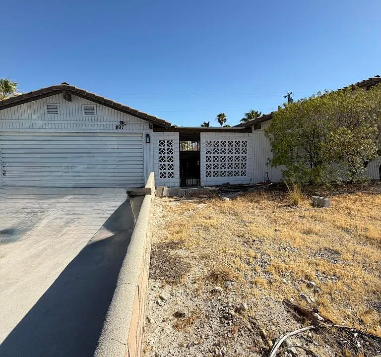 897 E Racquet Club Rd