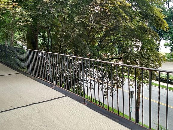 Veranda overlooking Park, Hudson River and Palisades, view s