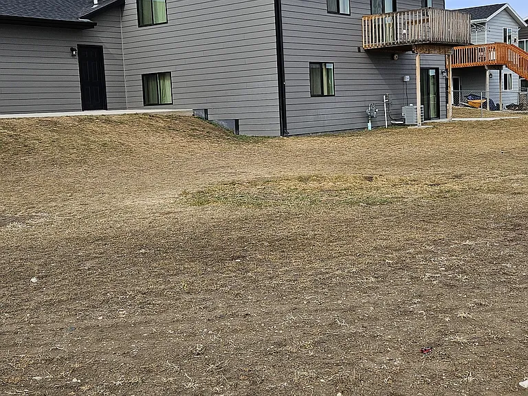 Back of House
- No stairs to deck - Cement Patio out the back door of the garage