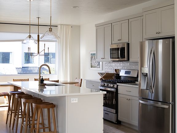 kitchen with quartz counter top island