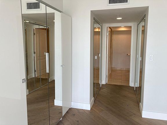 Hallway from bedroom to primary bathroom