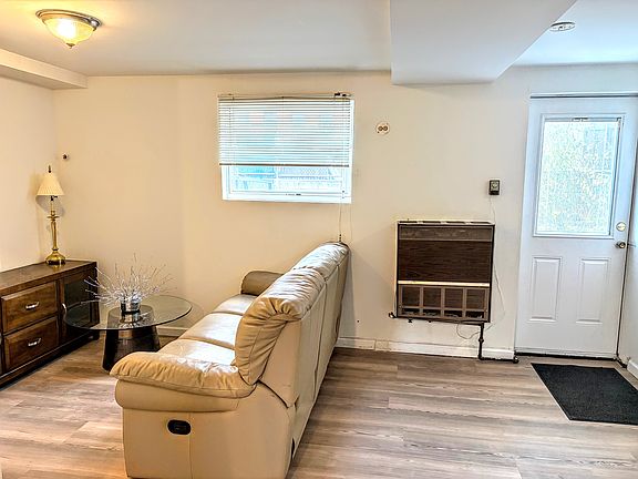 Living room with door to backyard