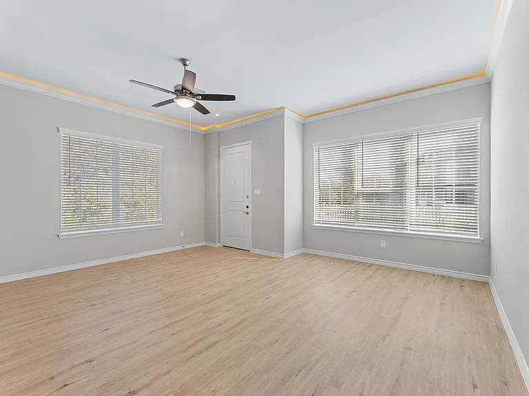 Open Space Living Room with Crown Molding - New Home