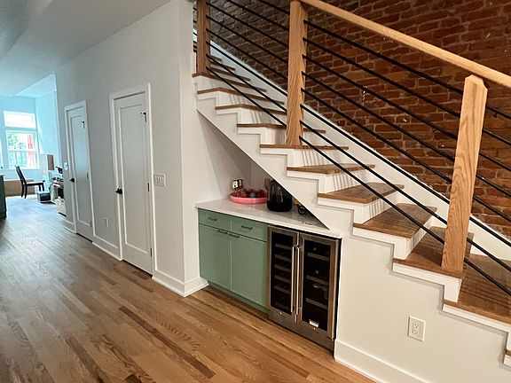 wine/beer bar under stairs