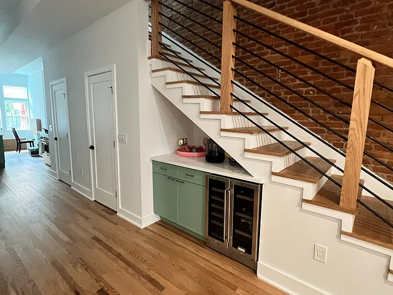 wine/beer bar under stairs