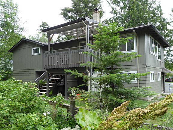 back of home & covered deck