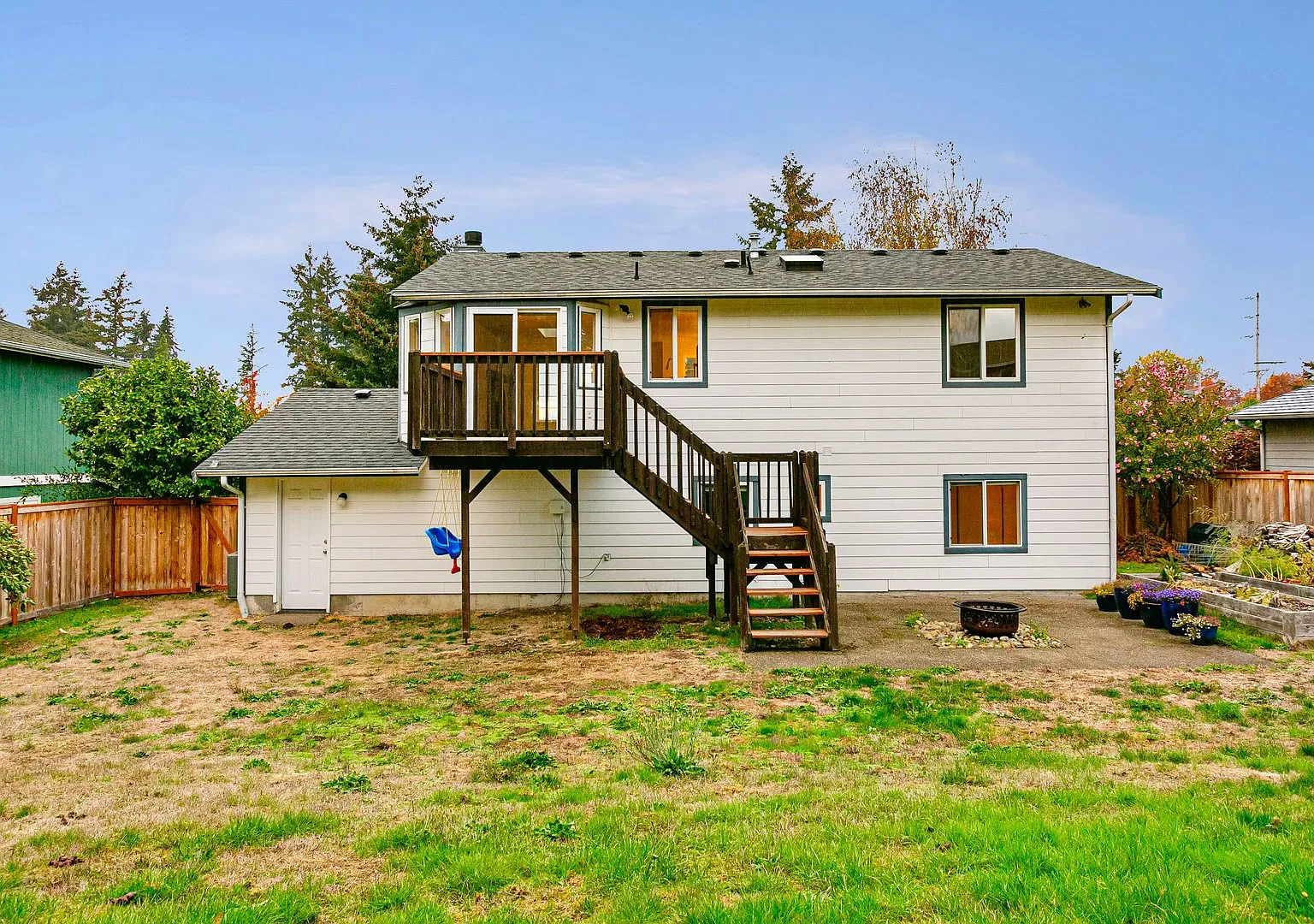 Updated 4-Bedroom Home with Deck & Two-Car Garage — Photo 3