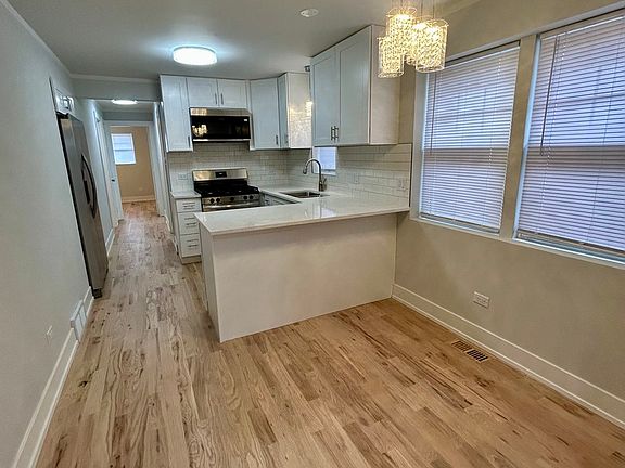 4th image of 6755 S Bell Ave