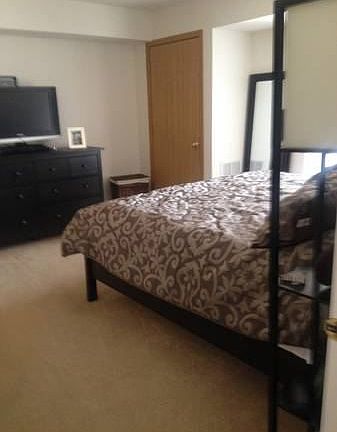 master bedroom with adjoining bathroom