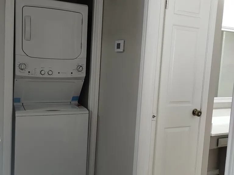 3x2 washer dryer included in hallway