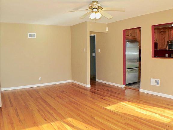 Living Room with hardwood floors and open to the kitchen