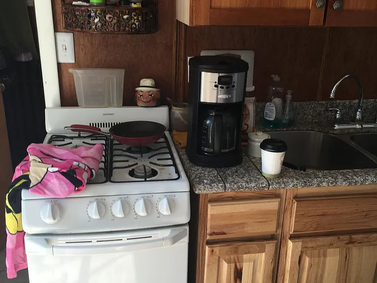 Kitchen stove and cabinets.
