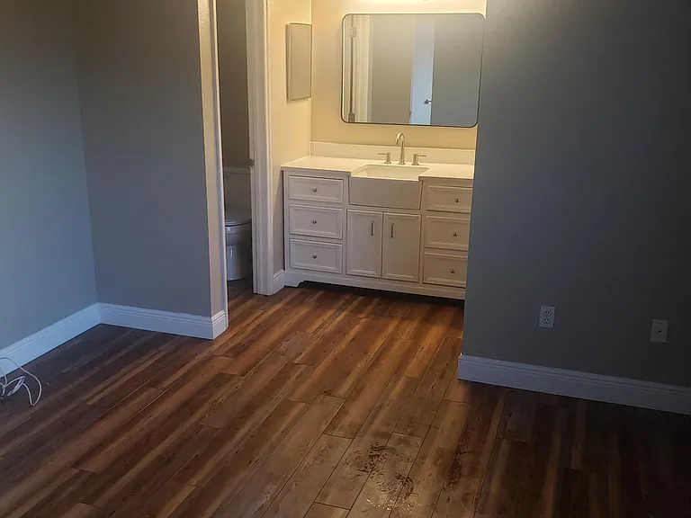 Newer master Vanity and vinyl floor
