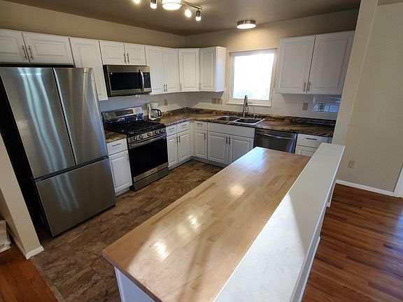 New stainless stell appliances in remodeled kitchen