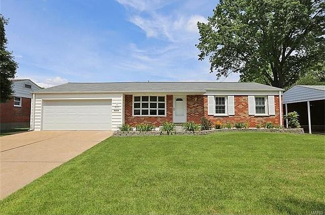 Well kept home with brick and vinyl exterior and 2 car oversized garage!
