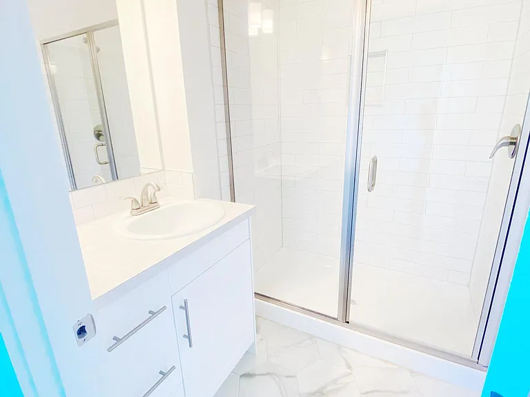 Large floor to ceiling tile master shower!