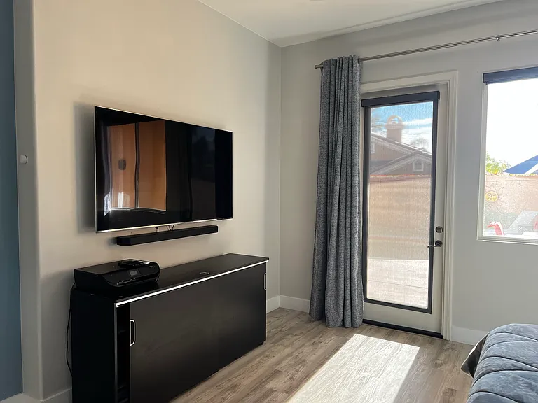 65" TV in Master Bedroom
Door to access the yard
