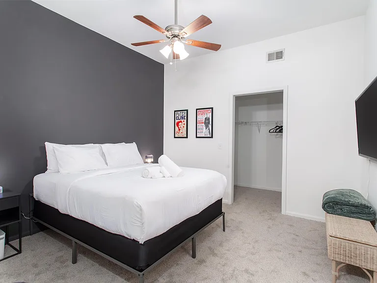Second Bedroom.... Queen Bed Shown.... King compatible... Big Walk In Closet that fits Dresser also.