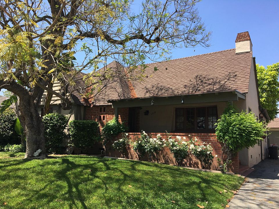 Front of house with cozy patio