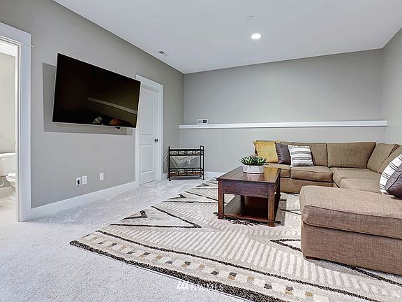 5th Guest Bedroom currently used as a Media room. (not shown to your right is a window and second closet.  Full ensuite bath.