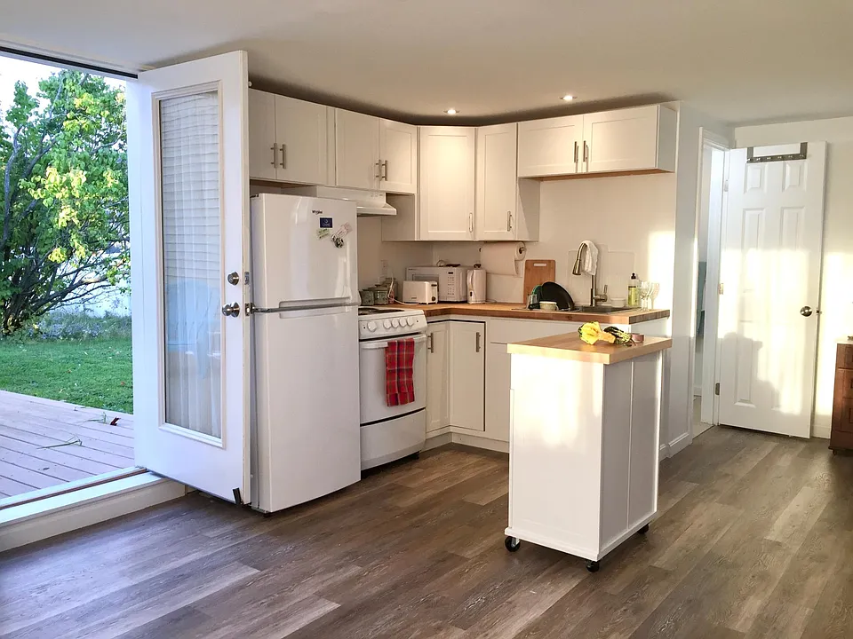 Kitchen and exit to the back porch