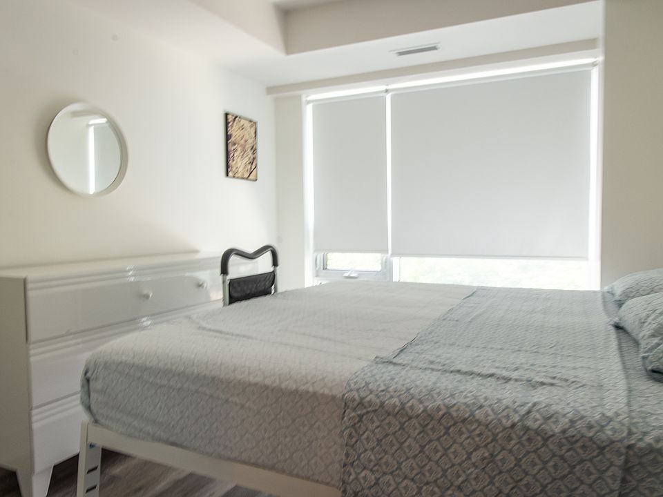 bedroom prior to removal of furniture and king-sized bed