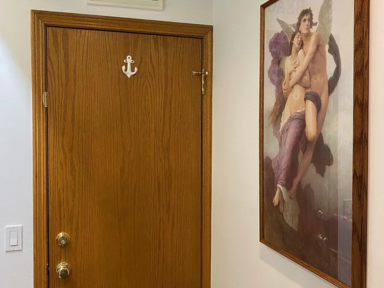 Oak framed Bogareau Print hides a storage area