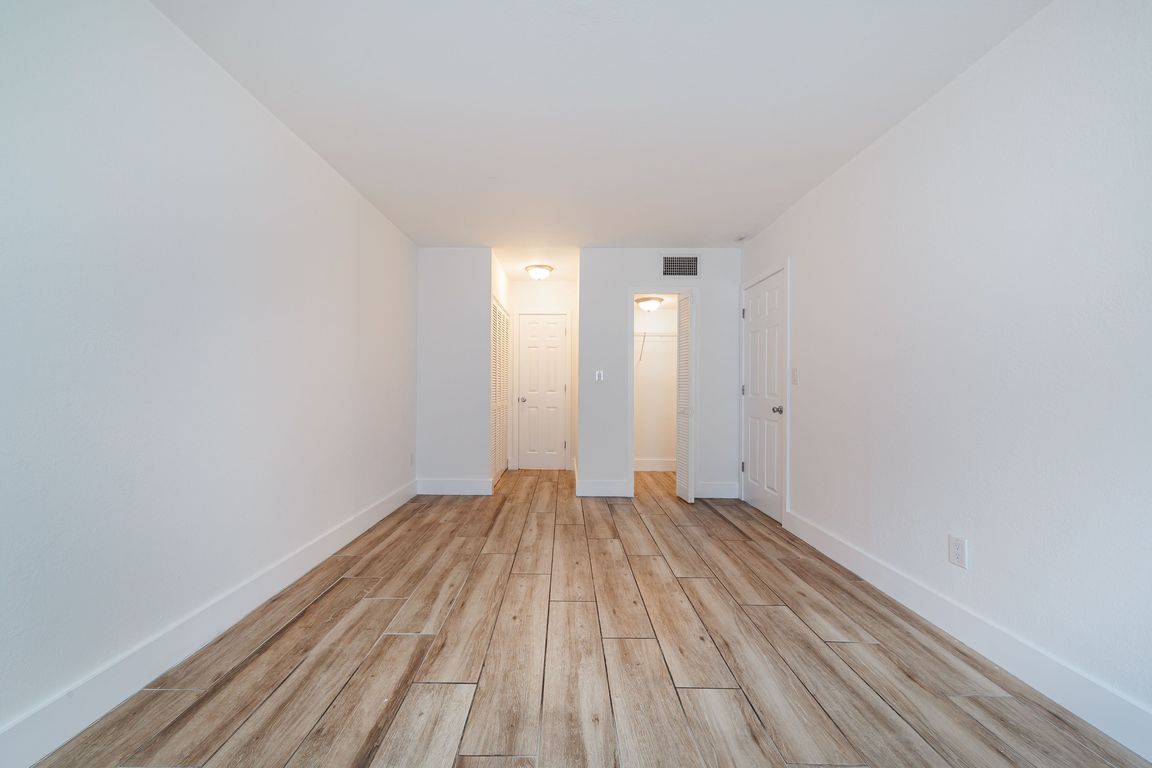 Bedroom with Beautiful Floors | Apartment Homes For Rent In Miami | Miami Shores