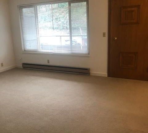 LIVING ROOM AND DOOR TO DECK