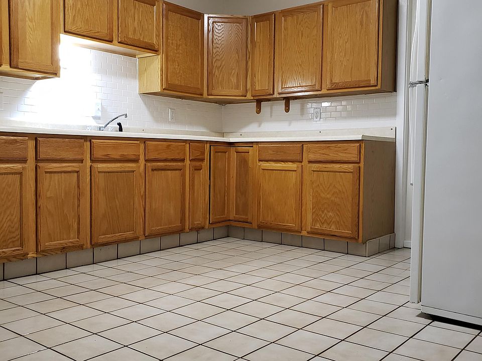 Kitchen with newly tiled back splash wall.