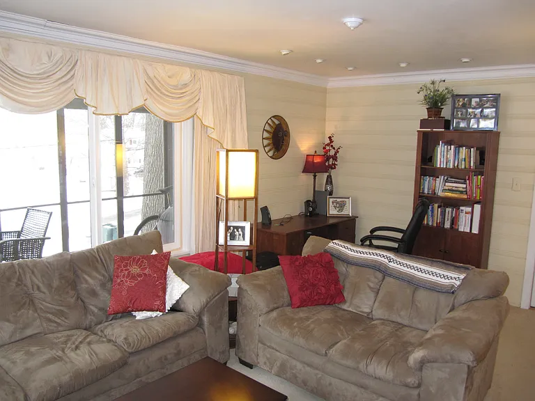 Living room with large window facing Winona Lake