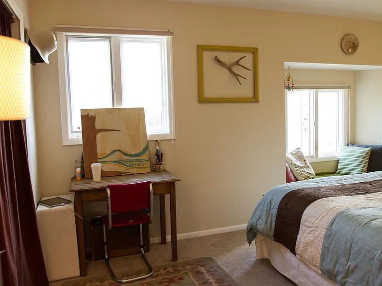 Upstairs bedroom with bay window