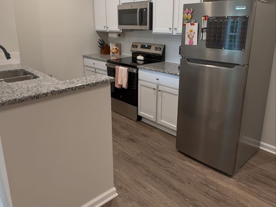 2025 build: all-new appliances, granite counters, and stylish fixtures.