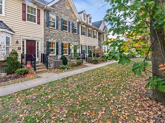Private front entryway facing wooded area