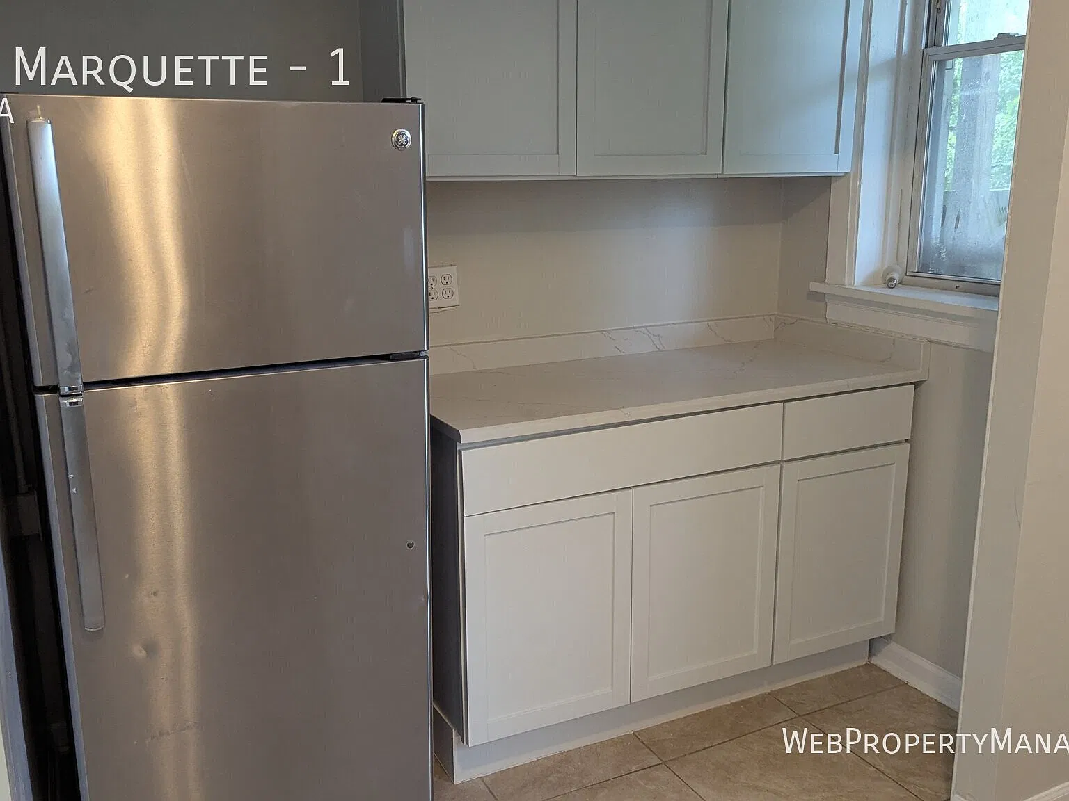 2 Bed 1 Bath w/Granite, Hardwood floors, & In unit Laundry — Photo 1
