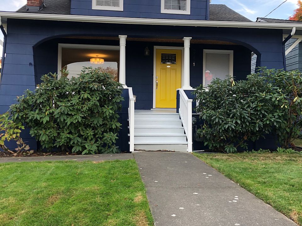 Welcome home -- home sits on a verdant slightly elevated lot close to everything Tangletown and Green Lake has to offer. Sit on the front porch a while or head on in.