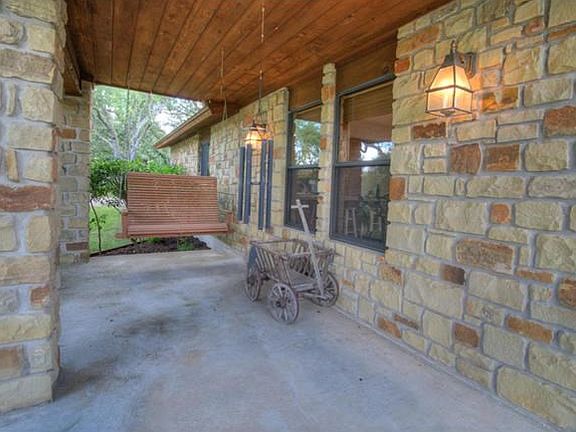 Nice, covered front porch to enjoy wildlife viewing.
