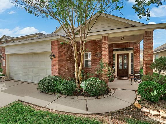 A large covered porch compliments the curb appeal of the home.
