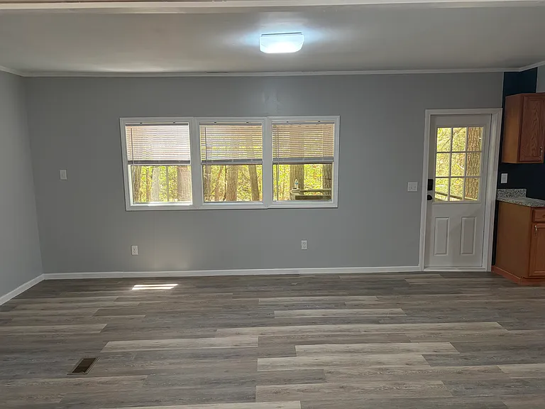 Living room, looking toward front door.