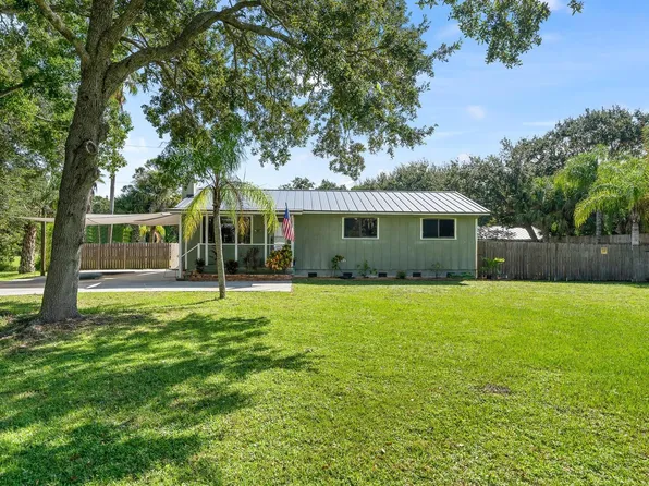 9633 Honeysuckle Dr, Micco, FL 32976