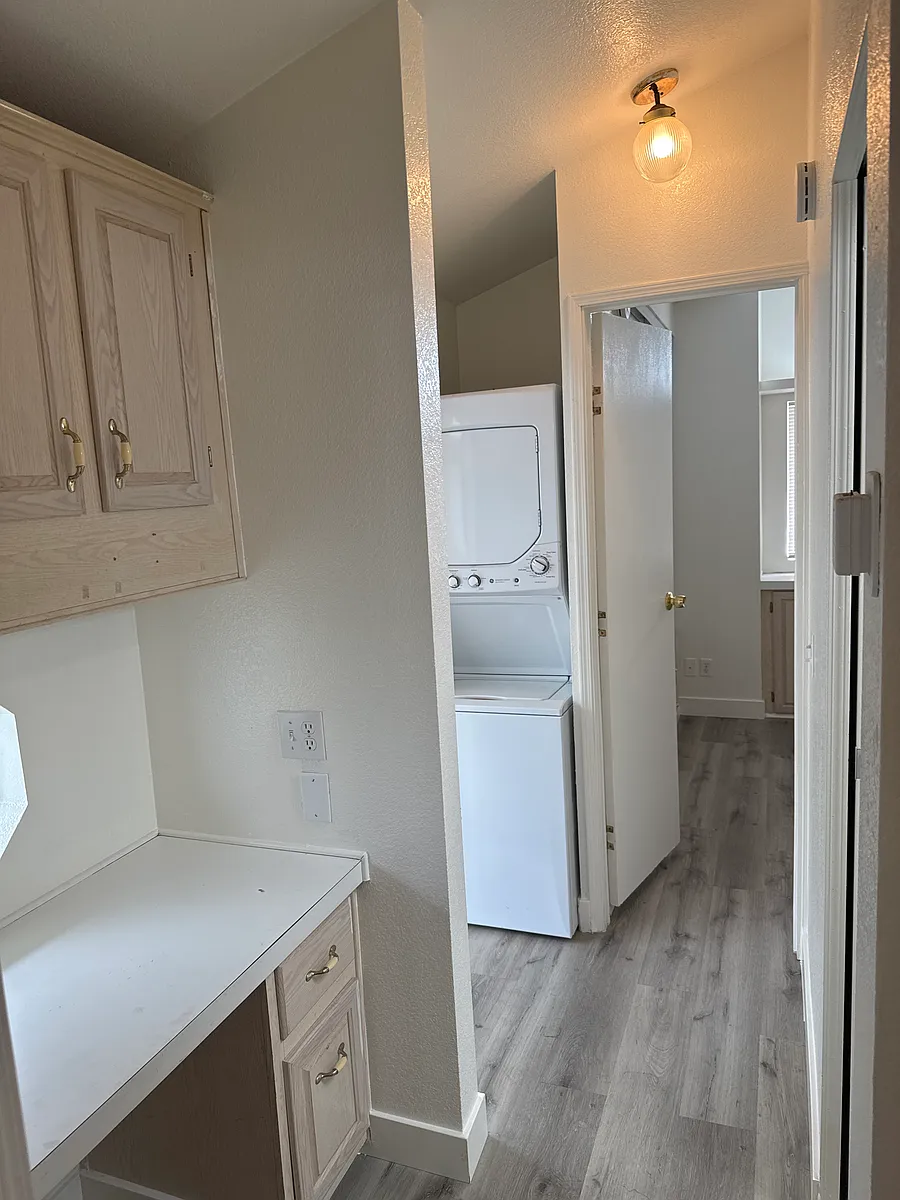 Building Photo - 12265 Woodruff Ave #48