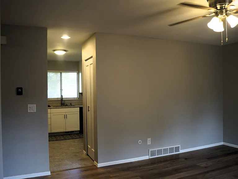 View from the front door into the Livingroom and kitchen.