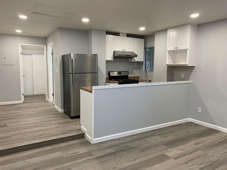 Remodeled kitchen, living room area.