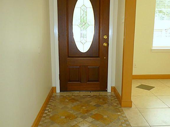 Inviting front entry with lovely tile floors