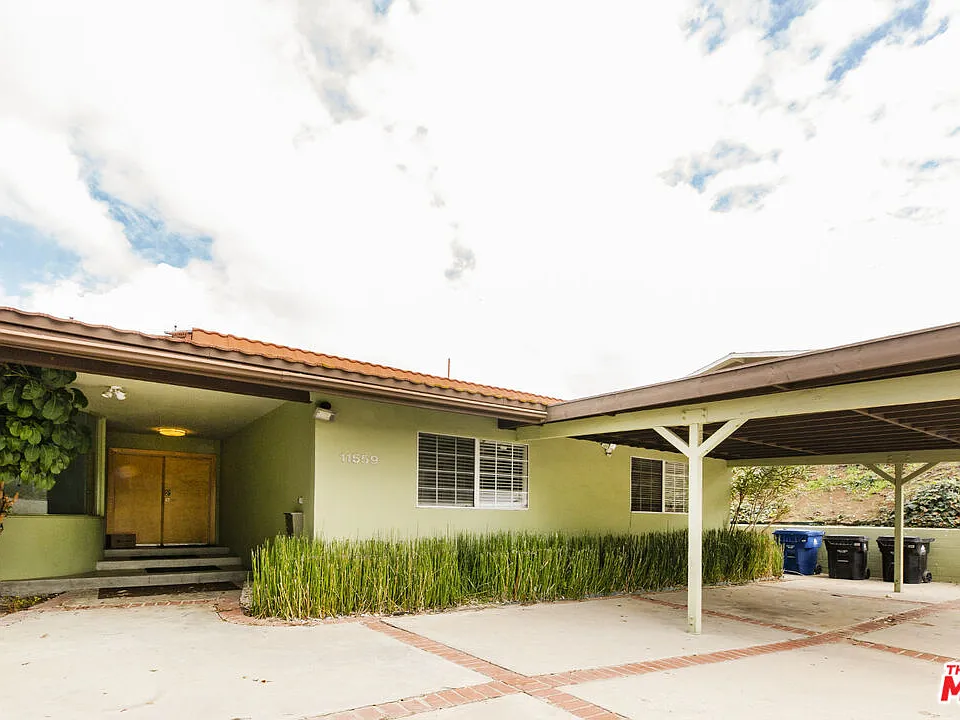 11559 Dona Evita Dr