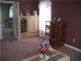 Living Rm leads to Family Rm-enc. w/ French Doors