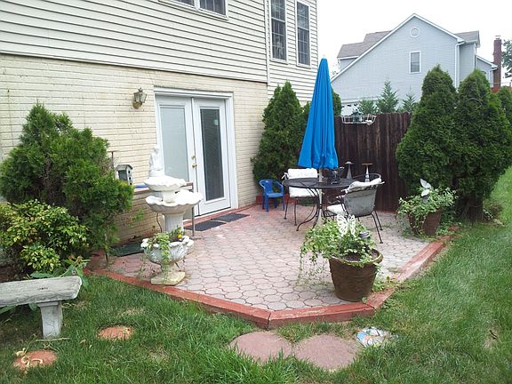 Separate rear entrance with patio and walkway
