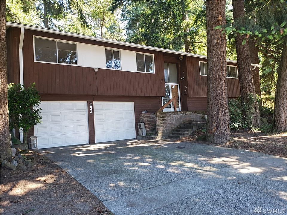 Nice home in private natural setting. Large driveway, 2 car garage parking + room for workshop.