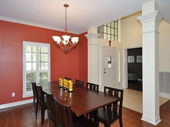 Open views of entry and dining.