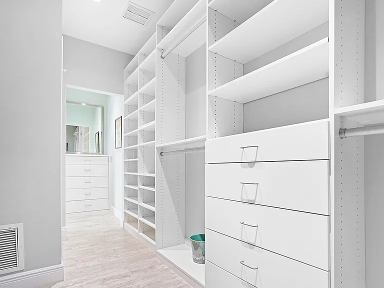 Primary Closet w. builtin drawers